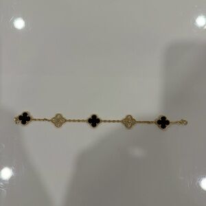 Gold-Tone Clover Link Bracelet with Black Accents